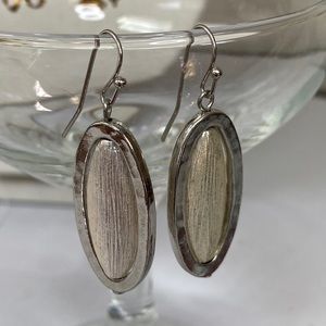Unique abstract silvertone oval style earrings